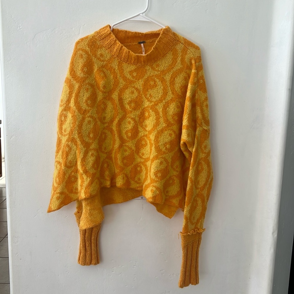 Free people peace sign sweater